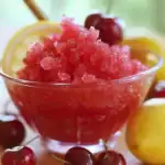 Sweet Cherry Lemonade Slush Recipe - Refreshing summer beverage with fresh cherries, lemon juice, and icy texture, perfect for hot days. Explore step-by-step instructions on Station Recipes.