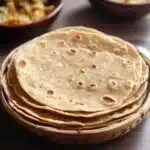 Soft, freshly baked flour tortillas stacked in a woven basket, perfect for making tacos, burritos, or wraps; ideal for quick, delicious Mexican-inspired meals.