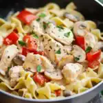 Creamy chicken and mushroom pasta with fresh herbs and spices, perfect for quick and delicious weeknight dinner options from Station Recipes.