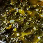 Sauteed kale with garlic and red pepper flakes, a nutritious and flavorful side dish perfect for healthy eating and vegan recipes at Station Recipes.