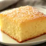 Fluffy homemade sponge cake with a golden crust and light, airy texture, perfect for baking enthusiasts and dessert lovers. Ideal for special occasions or everyday treats, easy to make from scratch.