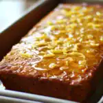 Sweet potato casserole topped with marshmallows and pecans, a classic Thanksgiving side dish. Perfectly baked with a caramelized topping, this comforting casserole is a favorite for holiday gatherings.