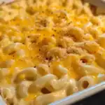 Creamy macaroni and cheese bake with melted cheddar, golden breadcrumb topping, perfect comfort food recipe from Station Recipes.