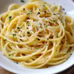 Creamy garlic Parmesan pasta with herbs from Station Recipes, perfect for a quick, flavorful meal. Easy to make, delicious, and ideal for weeknight dinners or special occasions.