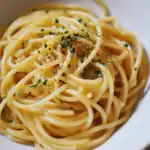 Creamy garlic Parmesan pasta with fresh herbs, perfect quick and easy dinner, made with simple ingredients for a flavorful Italian dish.
