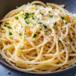Creamy Parmesan Garlic Pasta with Fresh Parsley and Black Pepper, a quick and easy comfort food recipe perfect for weeknight dinners and family meals.