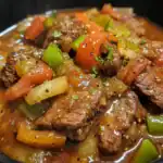 Flanken beef stew with carrots, celery, and onions in savory broth, home-cooked comfort food, delicious and hearty beef stew, perfect for family dinners and meal prep.