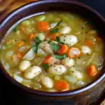 Warm, comforting chicken noodle soup with tender chicken, carrots, celery, and herbs in a flavorful broth. Perfect for cold days and nourishing meals.