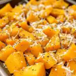 Cheesy roasted sweet potato dish with herbs, perfect for holidays and family meals, from Station Recipes.