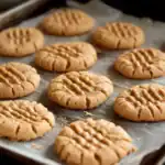 Delicious homemade cookies topped with caramel drizzle, freshly baked and perfect for snacks or desserts. Ideal for cookie lovers looking for easy recipes and tasty treats.