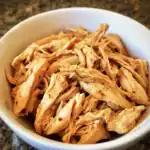 Juicy shredded chicken breasts, perfect for meal prep, salads, or tacos, seasoned with spices for a flavorful boost. Easy to cook, versatile, and ideal for quick, healthy meals.