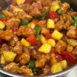 Colorful chicken stir-fry with pineapple, bell peppers, and a tangy sauce, perfect for quick, flavorful meals. Enjoy this easy station recipe for a delicious Asian-inspired dish.