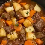 Hearty beef stew with potatoes, carrots, and onions in a savory broth. Perfect comfort food for cold days.