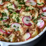 Delicious cheesy casserole with radishes, potatoes, ground beef, and fresh herbs, baked to perfection. A comforting and flavorful dish perfect for family dinners.