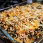 Delicious cheesy ground beef casserole with vegetables and crispy topping, perfect for family dinners and easy to prepare.